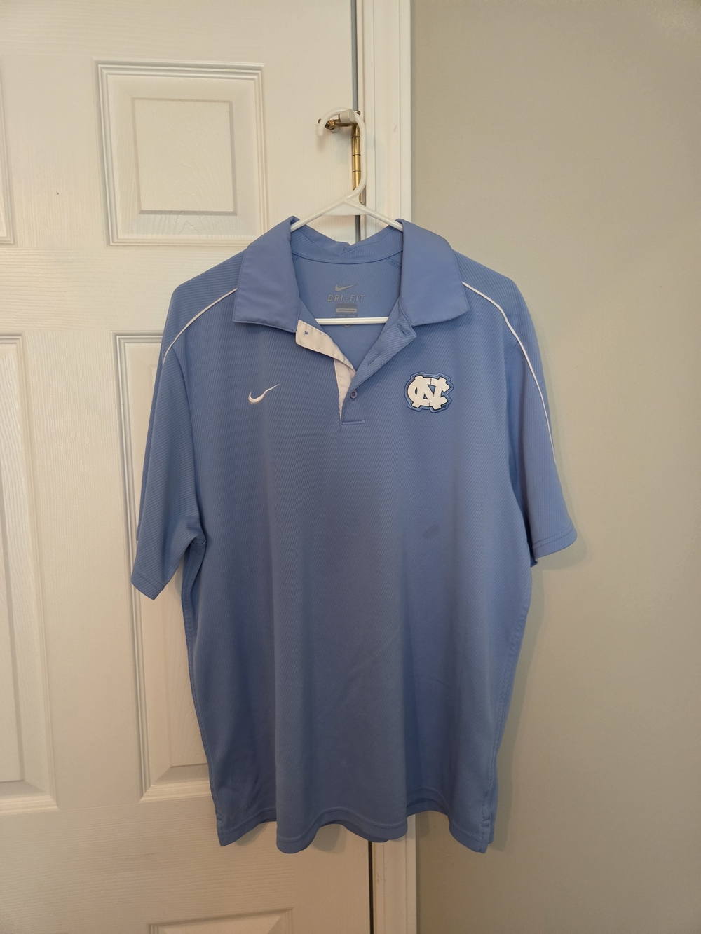 Nike Men’s Carolina Blue Polo Shirt with UNC Logo